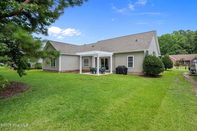 115 Neuchatel Rd, New Bern, NC 28562 - back of property featuring a pergola, a patio, a yard, and roof with shingles
