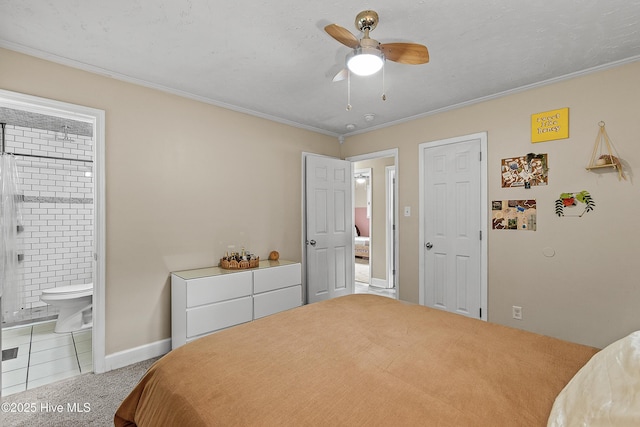 202 Regalwood Dr, Jacksonville, NC 28546 - carpeted bedroom with crown molding, ensuite bath, and ceiling fan