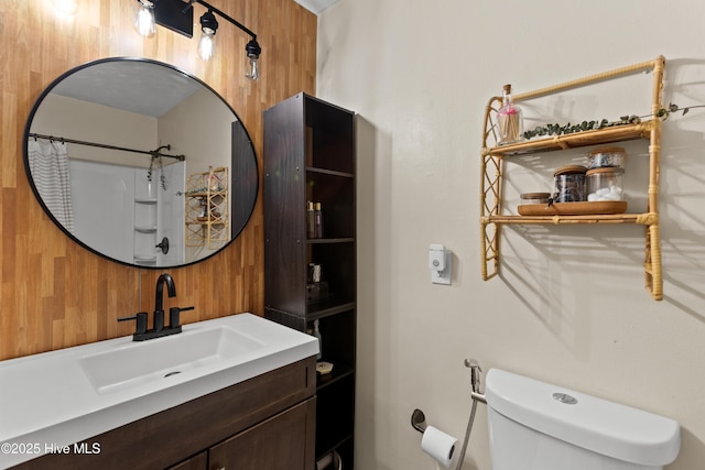 202 Regalwood Dr, Jacksonville, NC 28546 - bathroom featuring vanity, a shower with curtain, and wooden walls