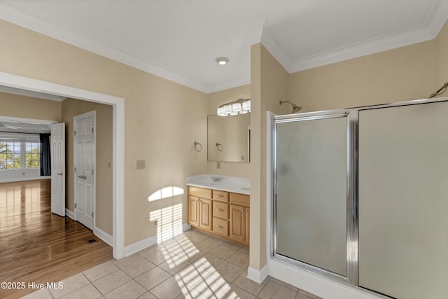240 Drake Lndg, New Bern, NC 28560 - full bathroom with double vanity, a shower stall, ornamental molding, and tile patterned floors