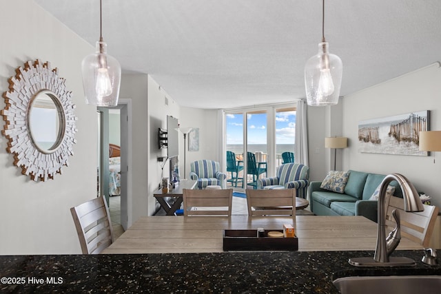 2000 New River Inlet Rd Unit 3513, North Topsail Beach, NC 28460 - dining room with a textured ceiling