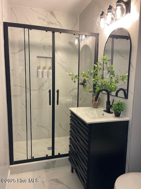 1451 Old Pink Hill Rd, Deep Run, NC 28525 - full bathroom featuring marble finish floors, vanity, and a marble finish shower