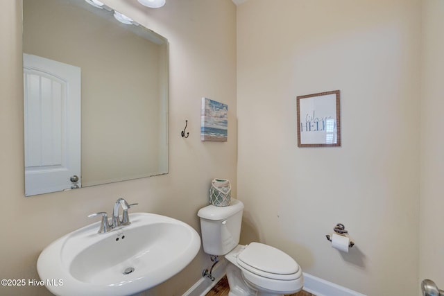 463 Avendale Dr, Rocky Point, NC 28457 - half bathroom with a sink and toilet