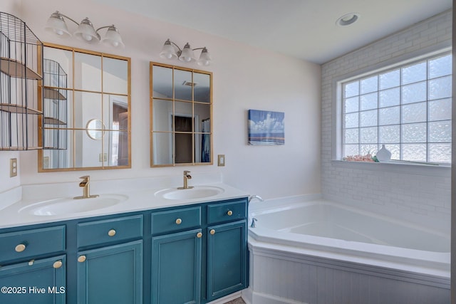 463 Avendale Dr, Rocky Point, NC 28457 - bathroom featuring double vanity and a bath