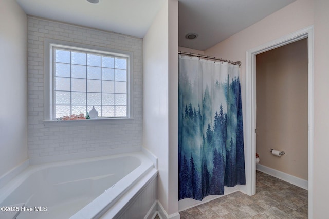 463 Avendale Dr, Rocky Point, NC 28457 - bathroom with plenty of natural light, a bath, and curtained shower