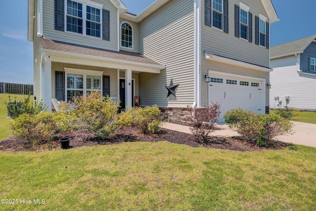 463 Avendale Dr, Rocky Point, NC 28457 - traditional-style home featuring a garage, a front lawn, concrete driveway, and a porch