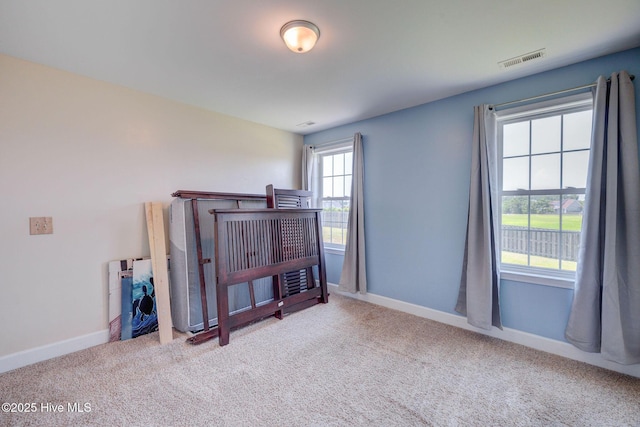 463 Avendale Dr, Rocky Point, NC 28457 - bedroom featuring carpet flooring and baseboards