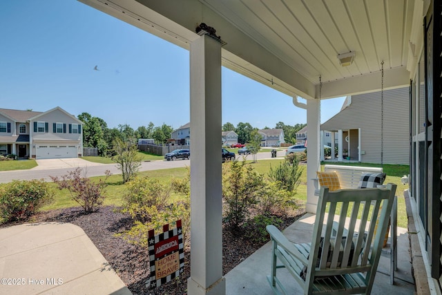 463 Avendale Dr, Rocky Point, NC 28457 - covered porch featuring a residential view and driveway