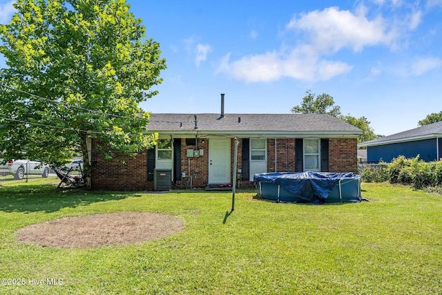 1106 E Stewart Cir, Wilmington, NC 28405 - view of front facade featuring a covered pool and brick siding