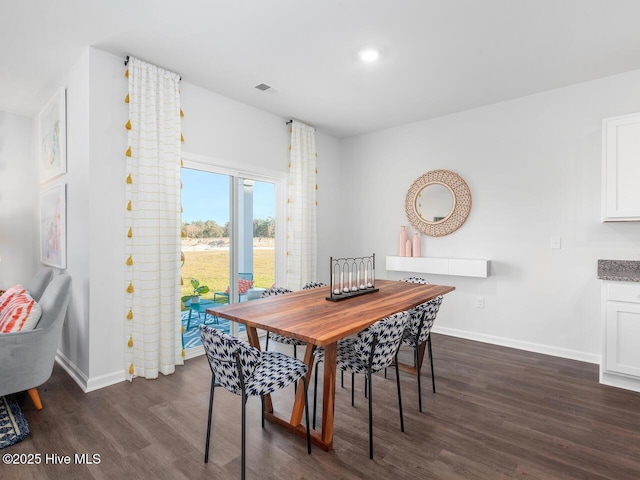 112 Edgewater Way Unit 57, Surf City, NC 28445 - dining space featuring dark wood-style flooring and recessed lighting