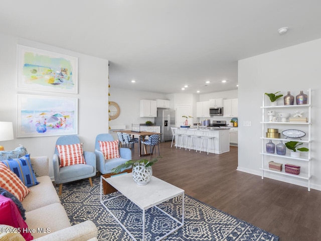 112 Edgewater Way Unit 57, Surf City, NC 28445 - living area with dark wood finished floors and recessed lighting