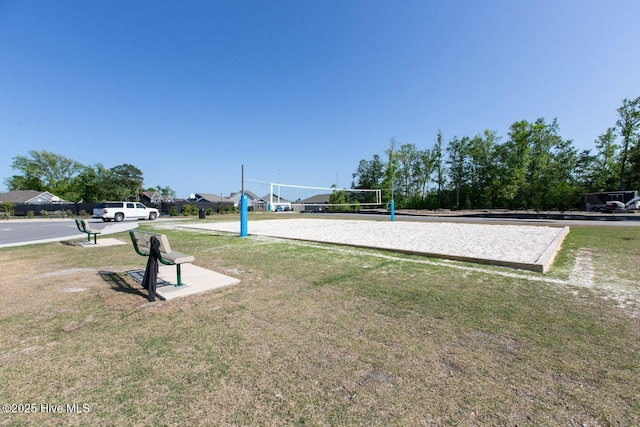 112 Edgewater Way Unit 57, Surf City, NC 28445 - view of home's community featuring volleyball court and a yard