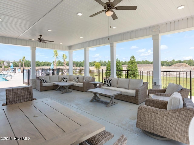 112 Edgewater Way Unit 57, Surf City, NC 28445 - view of patio with outdoor lounge area and ceiling fan