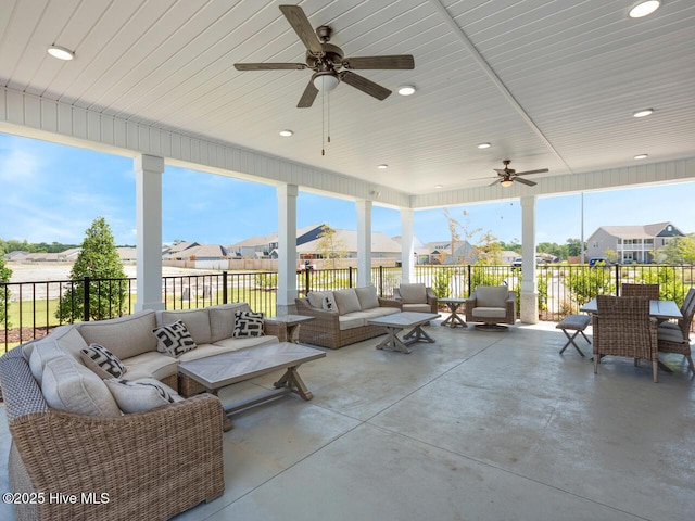 112 Edgewater Way Unit 57, Surf City, NC 28445 - view of patio / terrace with an outdoor living space, a residential view, and ceiling fan