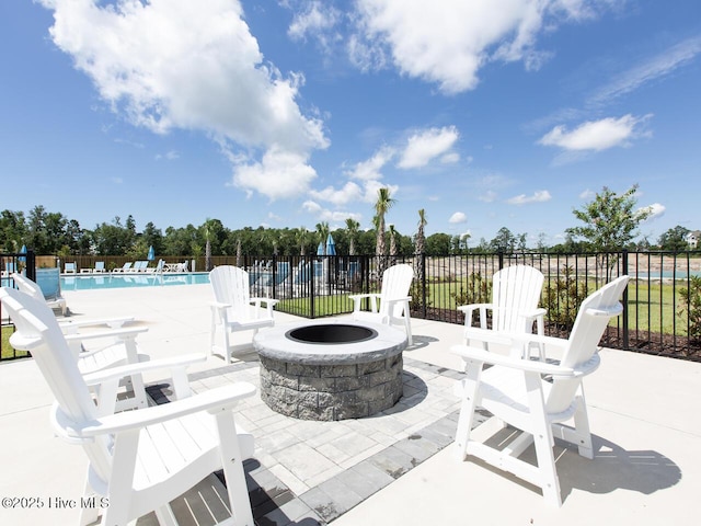 112 Edgewater Way Unit 57, Surf City, NC 28445 - view of patio featuring a fire pit and a community pool