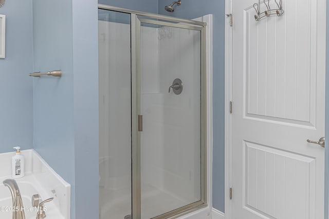 112 Mergini Dr, Pikeville, NC 27863 - full bathroom featuring a stall shower and a garden tub