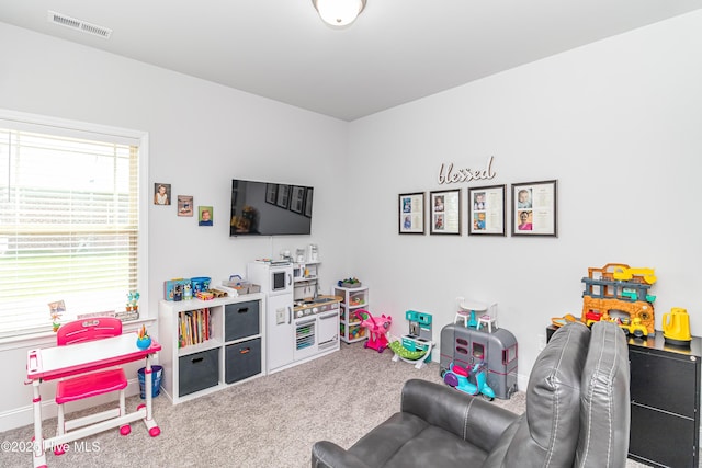112 Mergini Dr, Pikeville, NC 27863 - rec room with carpet floors