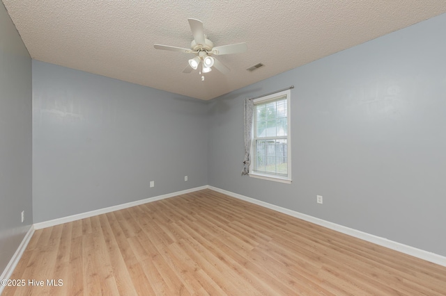 6723 Newbury Way, Wilmington, NC 28411 - empty room with light wood-style flooring, a ceiling fan, and a textured ceiling