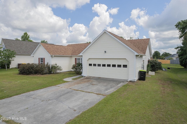 6723 Newbury Way, Wilmington, NC 28411 - ranch-style home featuring driveway, a garage, a front yard, and a shingled roof