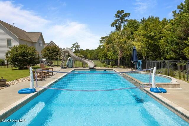 400 Lanyard Dr, Newport, NC 28570 - view of swimming pool featuring a water slide and a patio