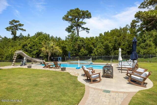 400 Lanyard Dr, Newport, NC 28570 - view of swimming pool with a water slide and a patio