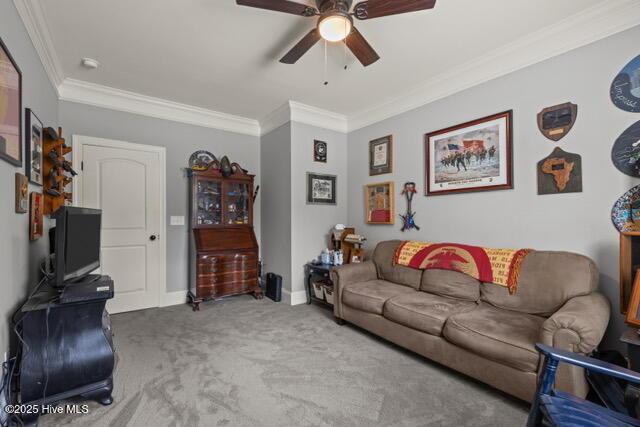 400 Lanyard Dr, Newport, NC 28570 - living area featuring crown molding, ceiling fan, and carpet floors