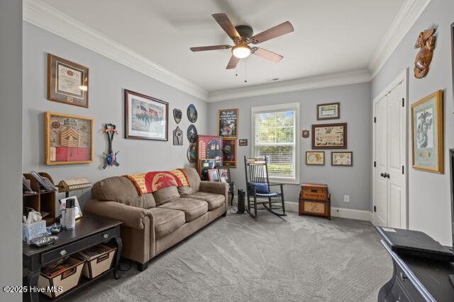 400 Lanyard Dr, Newport, NC 28570 - living area featuring crown molding, carpet, and ceiling fan
