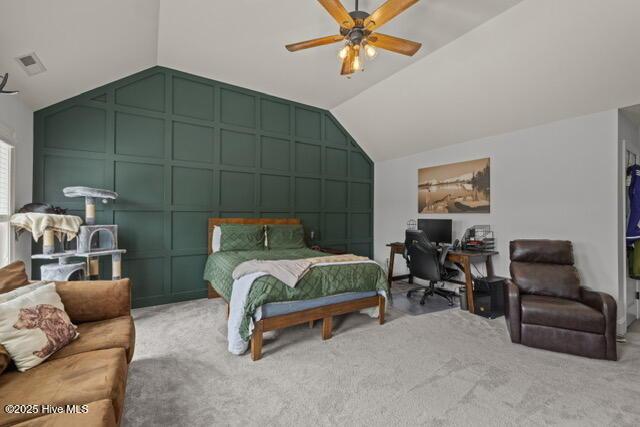 400 Lanyard Dr, Newport, NC 28570 - carpeted bedroom with a decorative wall, lofted ceiling, an office area, and a ceiling fan