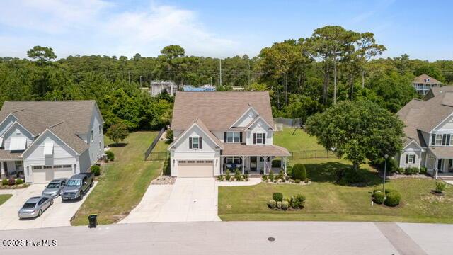 400 Lanyard Dr, Newport, NC 28570 - view of subject property featuring a heavily wooded area