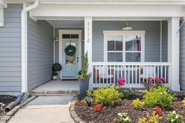 1112 Winged Seed Way, Wilmington, NC 28409 - doorway to property with a porch