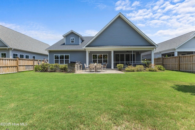 1112 Winged Seed Way, Wilmington, NC 28409 - rear view of property featuring a fenced backyard, a patio area, ceiling fan, and a shingled roof