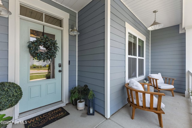1112 Winged Seed Way, Wilmington, NC 28409 - property entrance with a porch