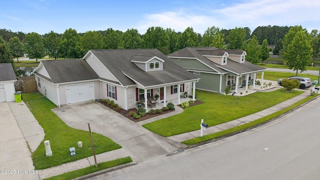 102 Bandon Dr, New Bern, NC 28562 - view of front of house with a porch, concrete driveway, an attached garage, and roof with shingles