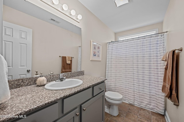 102 Bandon Dr, New Bern, NC 28562 - full bath with vanity, curtained shower, and stone finish flooring
