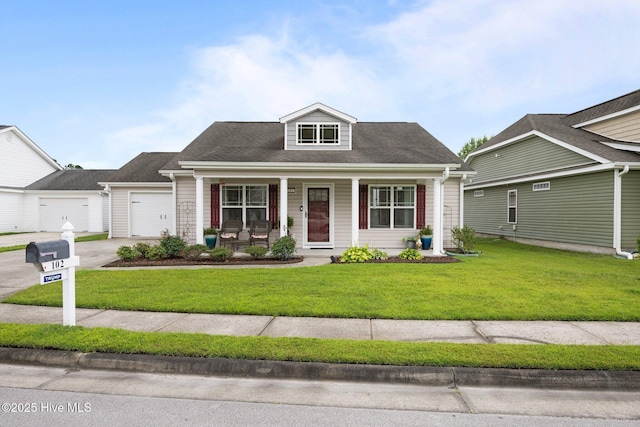 102 Bandon Dr, New Bern, NC 28562 - view of front facade featuring a porch, a front lawn, concrete driveway, and an attached garage