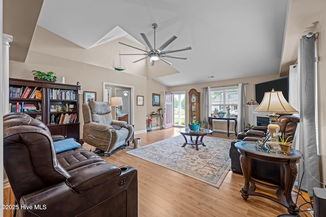 102 Bandon Dr, New Bern, NC 28562 - living area with lofted ceiling, light wood-style flooring, ceiling fan, and ornate columns