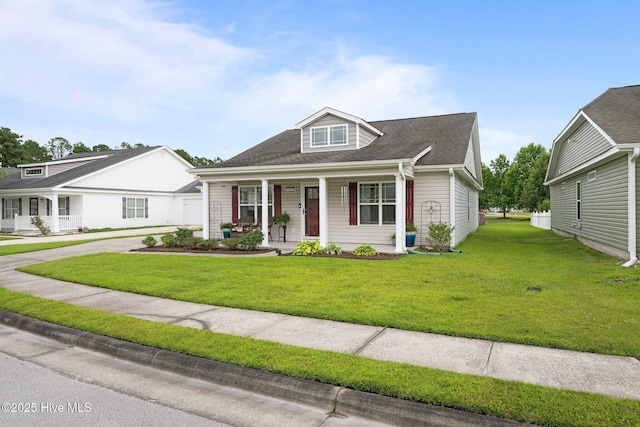 102 Bandon Dr, New Bern, NC 28562 - view of front of property featuring covered porch, a front yard, driveway, and roof with shingles