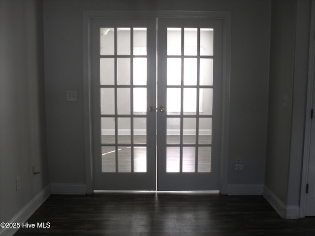 124 Pella Ln, New Bern, NC 28562 - empty room featuring french doors and dark wood-style floors