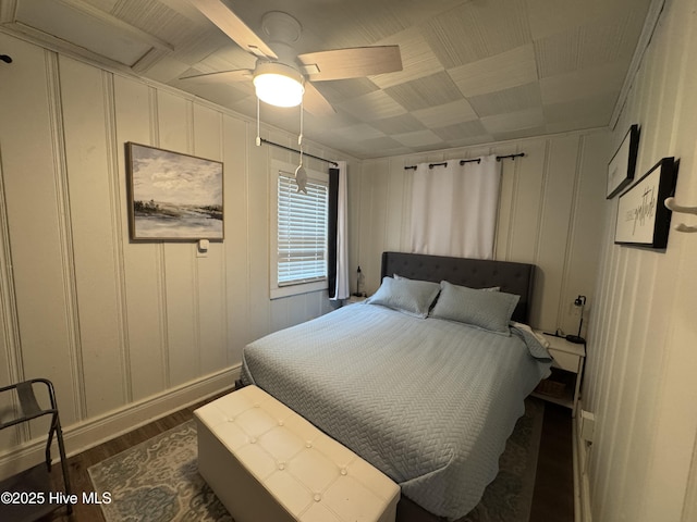 121 Cedar Point Blvd, Cedar Point, NC 28584 - bedroom with dark wood-type flooring, a decorative wall, ceiling fan, and attic access