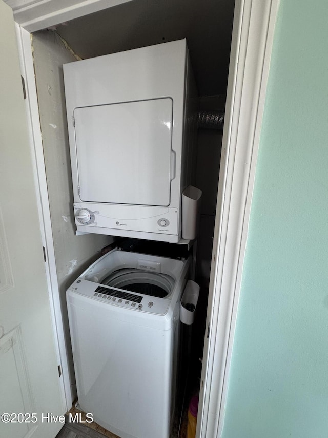 123 Cedar Point Blvd, Cedar Point, NC 28584 - washroom featuring estacked washer and dryer