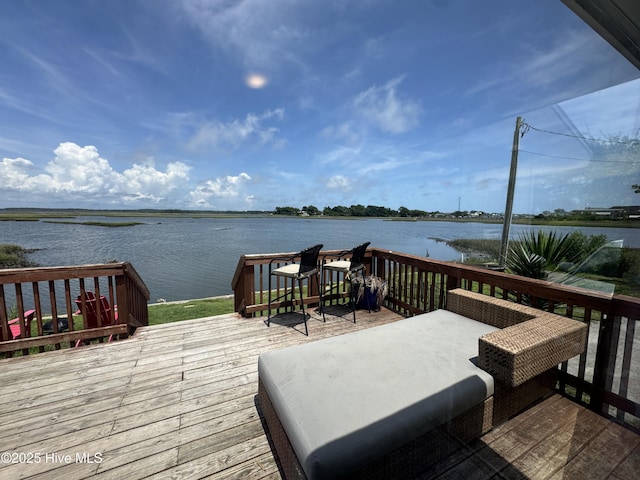 123 Cedar Point Blvd, Cedar Point, NC 28584 - wooden terrace with a water view