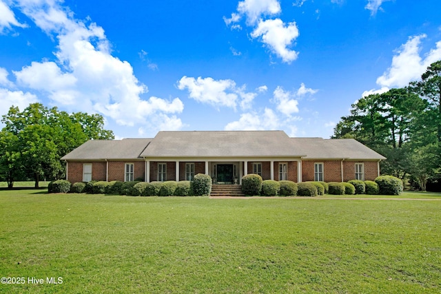 3509 Lakeview Trl, Kinston, NC 28504 - ranch-style house with a front lawn and brick siding