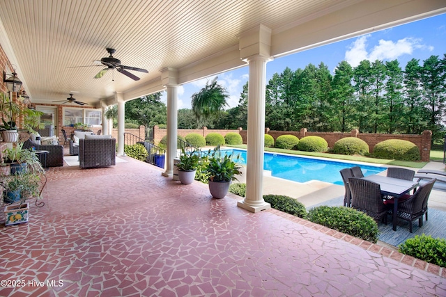3509 Lakeview Trl, Kinston, NC 28504 - view of swimming pool featuring a ceiling fan, a patio area, outdoor dining space, and a fenced backyard