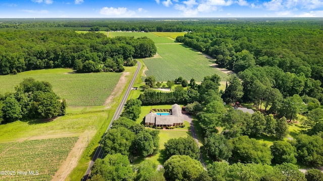 3509 Lakeview Trl, Kinston, NC 28504 - view of rural area with farmland and a forest