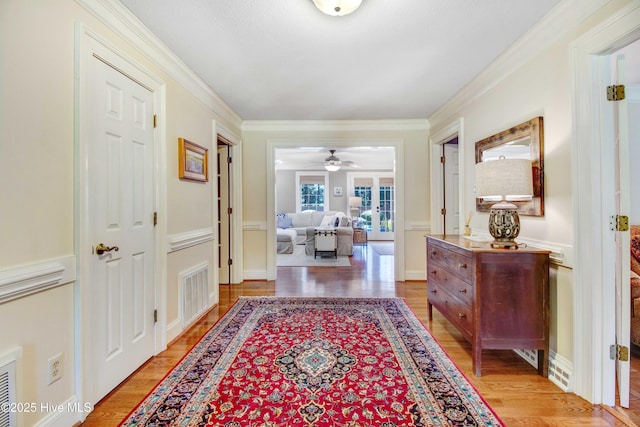 3509 Lakeview Trl, Kinston, NC 28504 - hall with light wood-style flooring and crown molding