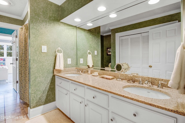 3509 Lakeview Trl, Kinston, NC 28504 - full bathroom featuring ornamental molding, double vanity, tile patterned floors, and wallpapered walls