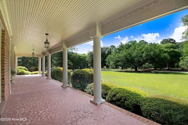 3509 Lakeview Trl, Kinston, NC 28504 - porch featuring a lawn and view of scattered trees