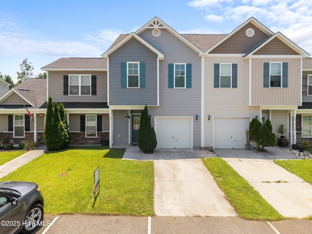 304 Cedar Island Trl, Holly Ridge, NC 28445 - view of front of house featuring a front lawn, a garage, and concrete driveway