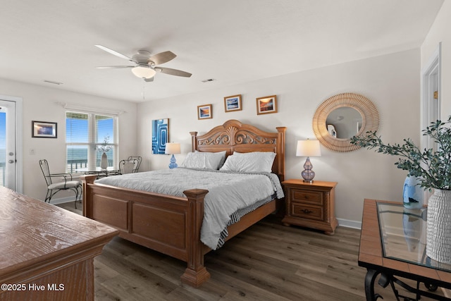 533 Ocean Blvd W, Holden Beach, NC 28462 - bedroom featuring dark wood finished floors and ceiling fan