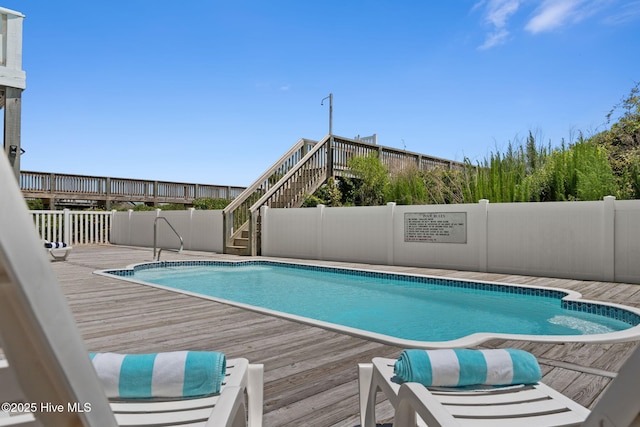 533 Ocean Blvd W, Holden Beach, NC 28462 - view of pool featuring stairway and a wooden deck